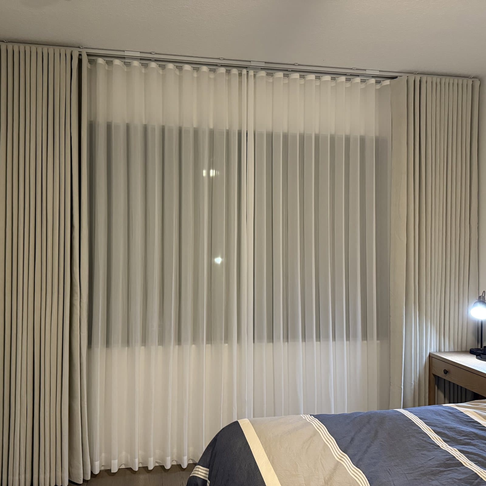 Custom drapery installed in a South Florida bedroom